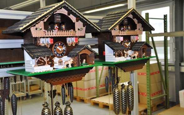 Two typical Swiss cuckoo clocks next to each other
