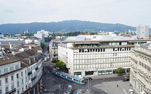 View of Paradeplatz in Zurich with UBS and Credit Suisse buildings.