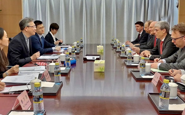 Assistant State Secretary of Switzerland for Asia and Pacific,  Ambassador Heinrich Schellenberg in talks with Ambassador Wang Lutong, Director General of European Affairs at the Ministry of Foreign Affairs of China, 13 March 2023, Beijing.