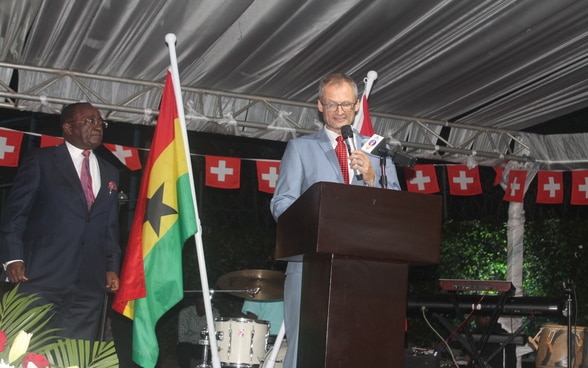 Ambassador Stalder, delivering his address