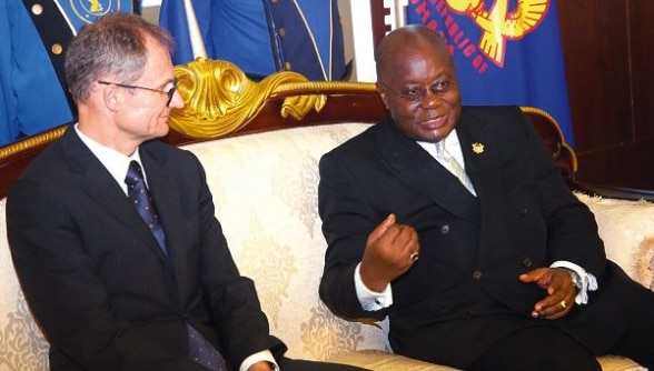 President Akufo-Addo interacting with Mr Philipp Stalder (left), the Swiss Ambassador to Ghana