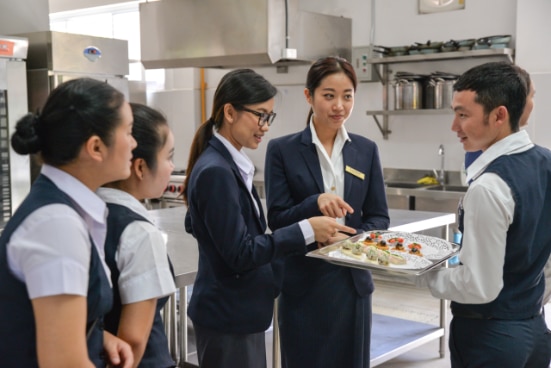 Students and trainers at a hotel and tourism training center in Vientiane Capital City, Lao PDR.