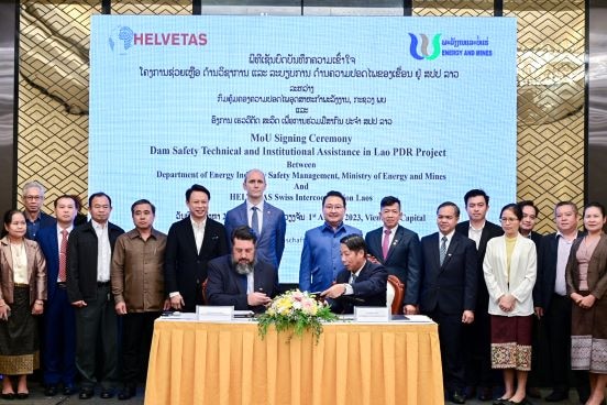 Jean-Gabriel Duss, SDC Regional Director of Cooperation Mekong Region(middle left, standing) attends MOU ceremony.