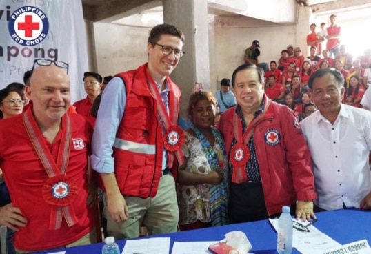 Deputy Head Mathias Domenig with PRC Chairman, CEO, and Senator Richard Gordon