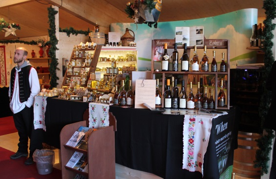 A vendor showcasing regional products at his stand as part of the Zemplén project in Hungary. 