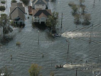 Aerial shot of flooding in the United States. People can be seen travelling around in boates.