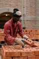Workers packing the fired bricks