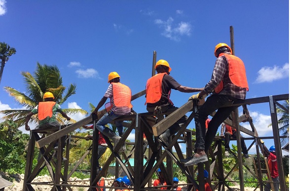 Workers learn how to build stable houses in cyclone-affected Southwestern Haiti.