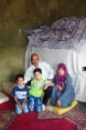 A Syrian family in temporary accommodation with a Lebanese family in the village of Kfartoun in the Akkar district on the Lebanese-Syrian border. 