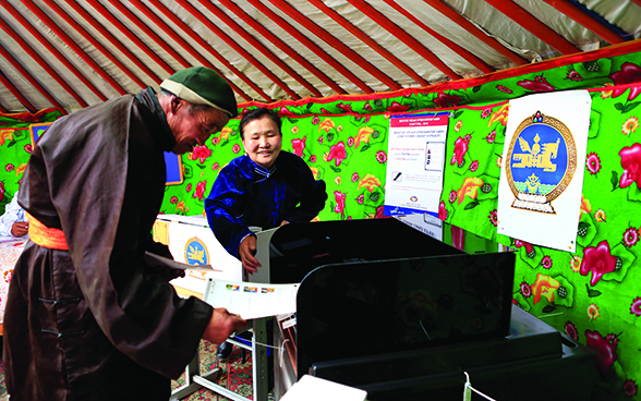 Voting at a rural polling station.