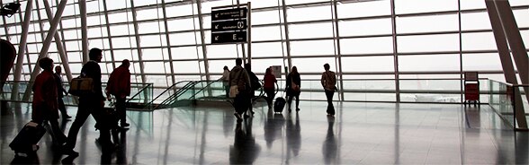Travellers with their luggage at Zurich airport