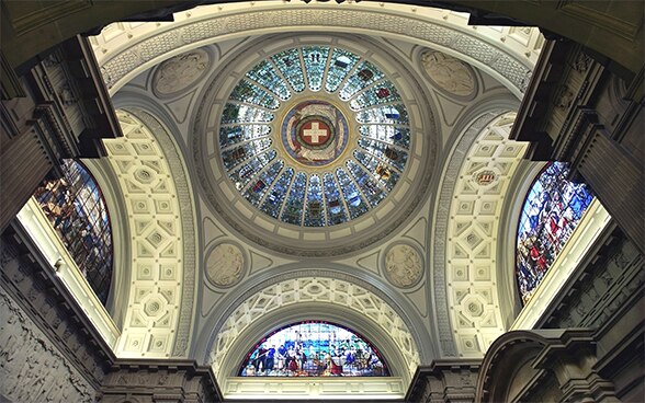Foto di persone che lavorano nella House of Switzerland a Londra nel 2012