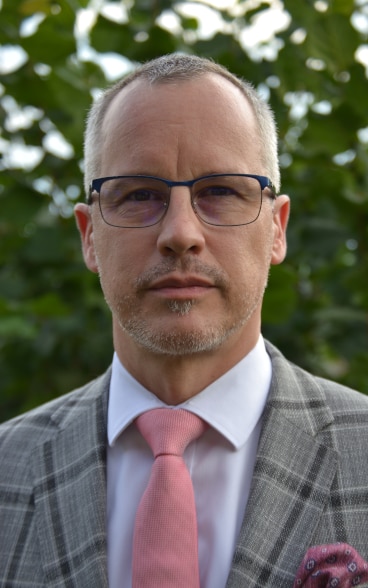 Portrait de Simon Geissbühler, président du Comité de pilotage des trois centres genevois.