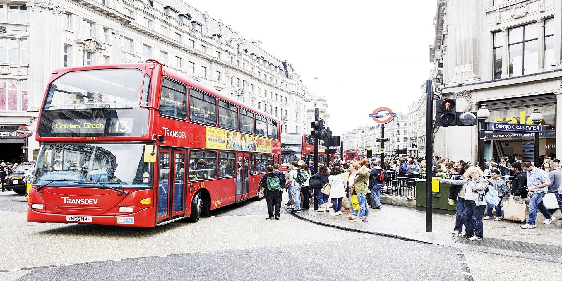 A classic red London bus at Oxford Circus.