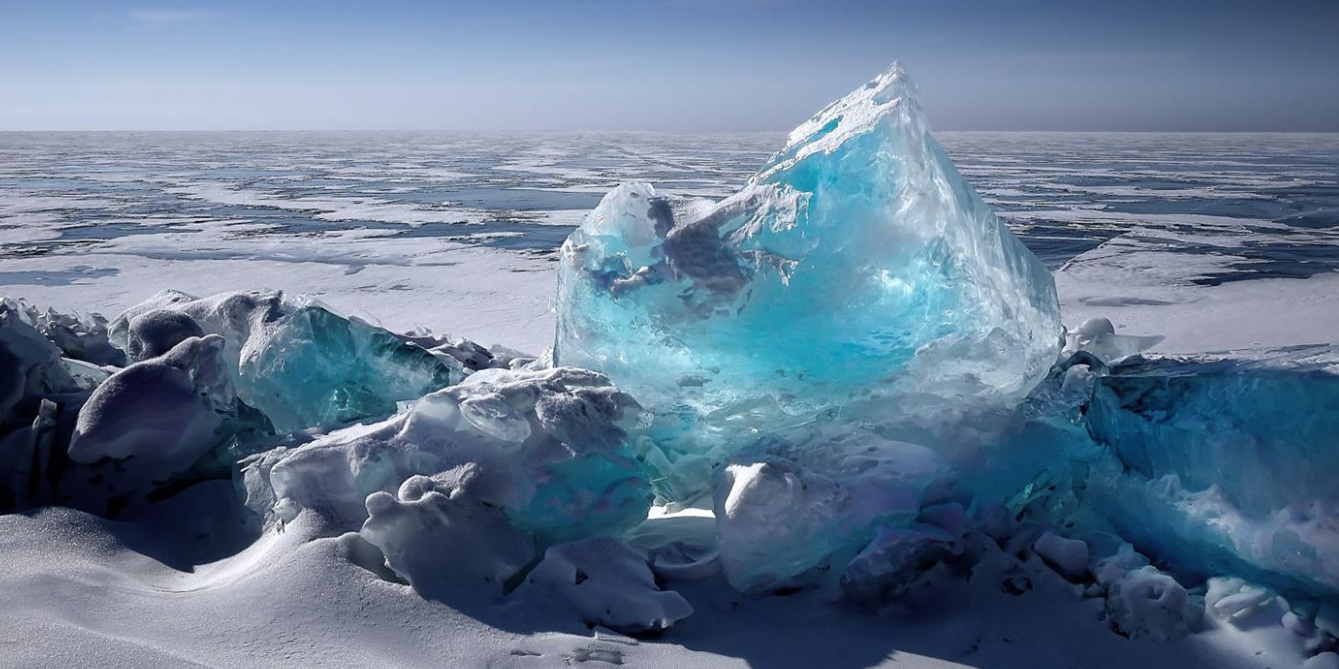 A block of blue ice on the ice floe.