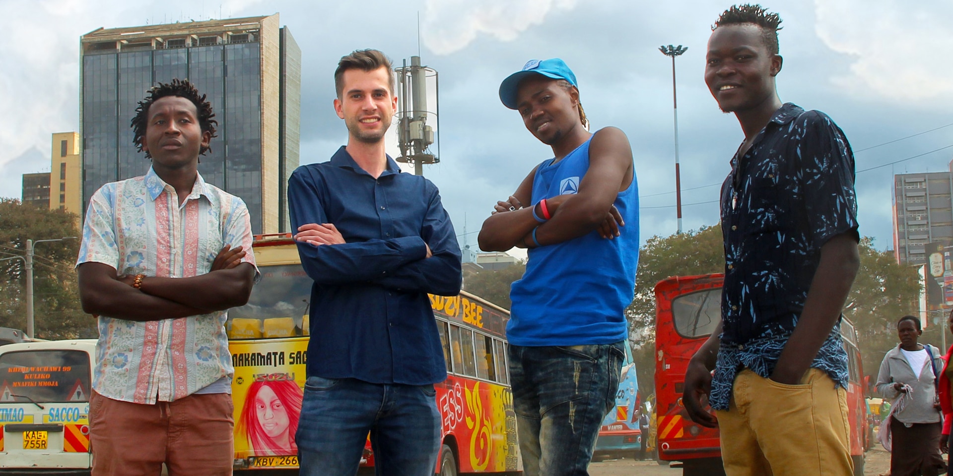 Four young men in a car park in Nairobi. 