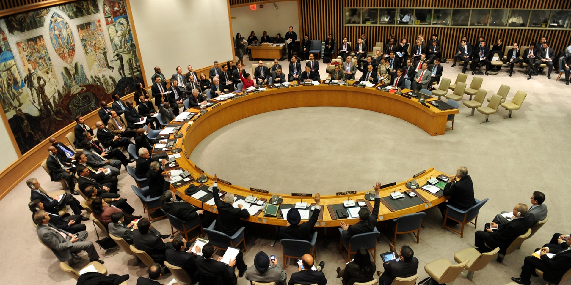 The member states of the UN Security Council vote on a resolution.