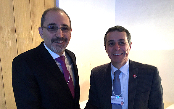 Federal councillor Ignazio Cassis meets Ayman al Sadafi, the Jordanian foreign minister, during the World Economic Forum.