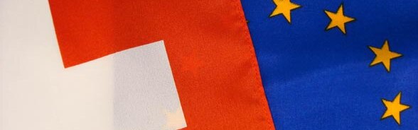 The flags of Switzerland and the EU