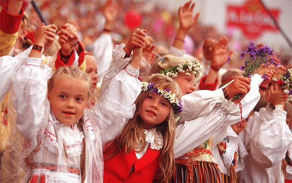 Children in traditional Estonian costume.
