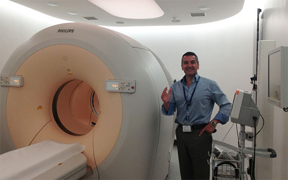 Dr Anthony Samuel Nuclear medicine specialist Head of the radiology department of the Mater Dei Hospital presents a PET scanner.